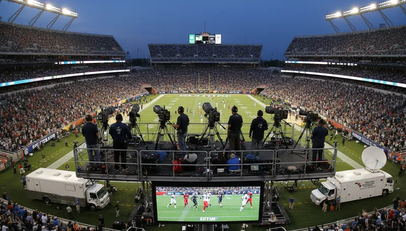 Illustration of televise: To broadcast something on television.